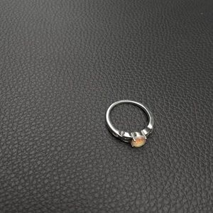 Sterling silver with faux opal gem